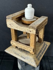lot 211 image: Collector of Illinois Pottery and Stoneware 1993 Collectible Potters Wheel Figurine