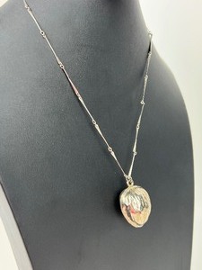 lot 330 image: Vintage Silver Tone Textured Walnut Pendant Necklace