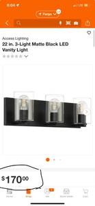 lot 26 image: Brand New Access Lighting 22 in. 3-Light Matte Black LED Vanity Light ($170 Retail Value)