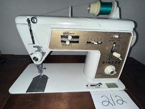 lot 212 image: Singer Sewing Machine and Supplies
