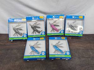 lot 4 image: Six X-Gear Deluxe Tool Knives