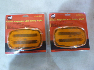 lot 72 image: 2 White Dog Amber Magnetic LED Safety Lights