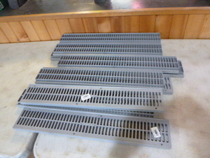 lot 164 image: 11 Channel Grates