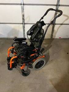 lot 49 image: MSRP $4000 Sunrise Medical Quickie Zippie Iris Tilt In Space Childs Wheelchair - Good Condition With Lots Of Extras  Needs A Little Clean Up