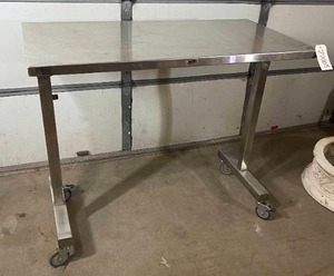 lot 70 image: WOW MSRP $3200 Midcentral Medical Heavy Duty 16 gauge #304 stainless steel&nbspHeight Adjustable Instrument Table&nbsp24W x 48L x 40 Leg Clearance - Great Condition 1st Pic Is Stock Pic