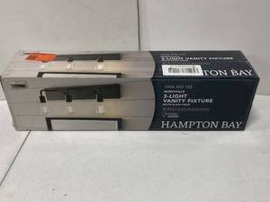 lot 22 image: Brand New Hampton Bay Northvale 24 in. 3-Light Matte Black Industrial Bathroom Vanity Light ($49 Retail Value)