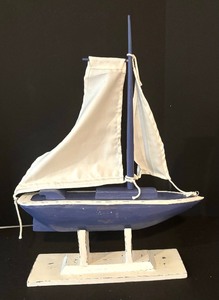 lot 304 image: Adorable Sailboat Decor