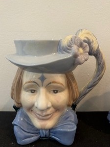 lot 515 image: Two Cute Clown Motif Mugs