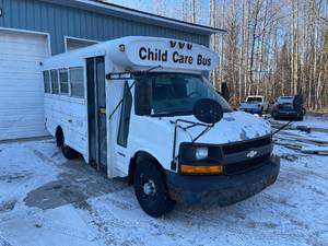 lot 2 image: 2006 Chevy G3500 Bus with 60,000 miles