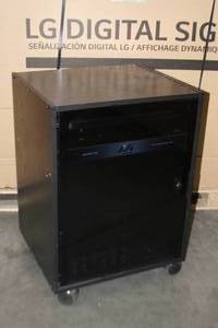 lot 75 image: Black Laminate Audio Video Equipment Rack on Casters with Rack Rails Smoked Glass Plexi Door Pro Audio Amplifier & More