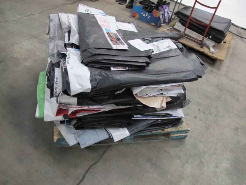 lot 126 image: Pallet of 17 Large Reused Lightweight PE Billboard Tarps