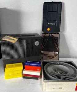 lot 21 image: Vintage Sawyers 550ER 2x2 slide projector, misc slides, table viewer