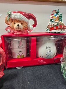 lot 78 image: Large & Small Fitz & Floyd Christmas Teddy Bear Pitchers (large has a MINOR chip, Rae Dunn Holiday Christmas Believe Cocoa Pot and Mugs, Living Quarters Reindeer Mugs NIB, Holiday Light Up Jar w Snowman and Ribbon & More