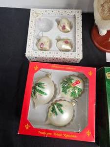 lot 80 image: Hand Decorated Glass Ornaments and 2 Santas on Wooden Stands