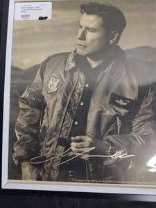 lot 12 image: Tony Orlando Autographed 8x10 Photo, Framed Autographed John Travolta 8x10 Photo, John Wayne Copper Alarm Clock - no certificates of authenticity