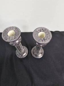 lot 169 image: Pair of African Black and White Tribal Candlesticks