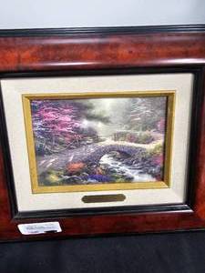 lot 181 image: Beautiful Framed Thomas Kinkade Wall Art Piece Bridge of Faith w Certificate of Authenticity, Thomas Kinkade Ceramic Butterfly Bell A Quiet Evening NIB & Thomas Kinkade Night Before Christmas Coach Lantern & More