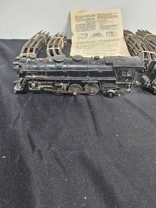lot 251 image: Marx Remote Controlled Electric Train Set with Diesel Locomotive and Automatic Coupler (electrical cord needs to be replaced)