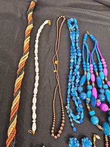 lot 155 image: Lot of Costume Jewelry Inc Colorful Necklaces, Faux Pearl Cluster Sweater Clip Chain, Clip On Earrings, Ring & More
