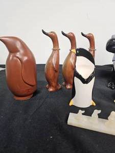 lot 215 image: Penguin Figurines and Decor - various sizes and colors. Wood, Ceramic and Stone