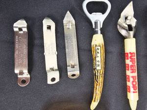 lot 108 image: Vintage Bottle Openers and Ash Trays  Antique Shoe Dressing and Spot Eraser  Mr. Nicks Liquors Shot Glass and More