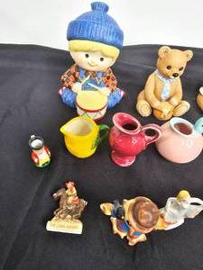 lot 216 image: Variety of Miniature Figurines, Unopened VHS Tape Hocus Pocus, Playboy Bunny White Plastic Swizzle Stick & More