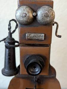 lot 112 image: Miniature Metal Crank Phone Bank