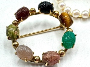 lot 172 image: Three Vintage Brooches including a Gold Filled Scarab Carved Brooch