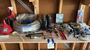 lot 139 image: Detached Garage Shelf Lot - Huge Lot of Sprinker System Supplies and More