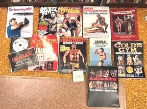 lot 279 image: Vintage Exercise Books and Magazines featuring Arnold Schwarzenegger and Franco Columbo)