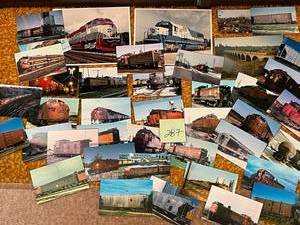 lot 287 image: Amazing Lot of Vintage Train Photos and Postcards