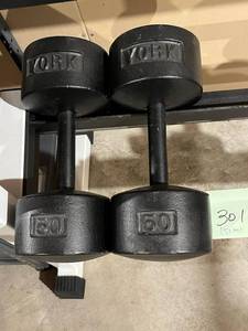 lot 301 image: York Metal 50lbs. Dumbbells (Like New)