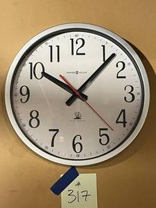 lot 317 image: Howard Miller Accuwave Wall Clock in good working condition