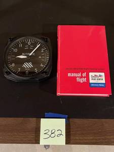 lot 382 image: Vintage Trintec Altitude Clock and 1981 Cessna Flight Training Book (Nice Condition)