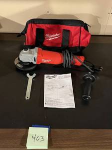 lot 403 image: Milwaukee 4.5 Grinder (Excellent Condition)