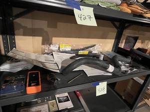 lot 428 image: Shelf Contents - 2011 Cadillac CTS Wipers, Hose, Clamps, and More