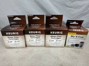 lot 8 image: New Keurig Reusable Coffee Pod and 6 Water Filters