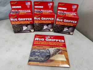 lot 62 image: New Rug Gripper Items
