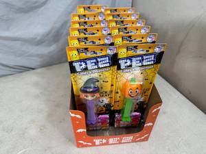 lot 66 image: 12 New Pez Candy Dispensers and Candy