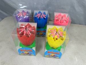 lot 83 image: 5 New Magicandle Blooming Singing Birthday Candles