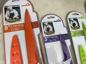 lot 86 image: 4 New Non Stick Stainless Steel Chef Knives