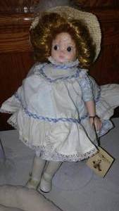 lot 43 image: Victorias Collectibles Doll Plus One.