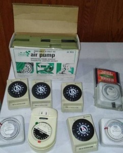 lot 47 image: Air Pump 12 Volt And Household Timers.