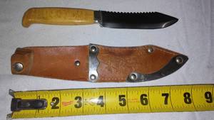 lot 91 image: Knife With Leather Sheath.