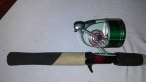 lot 102 image: Heddon 185 Reel And Sport Fish Rod.