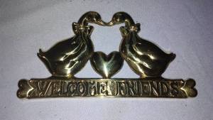 lot 381 image: Welcome Friends Brass Plague.