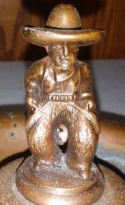 lot 388 image: Copper Cowboy Ashtray.