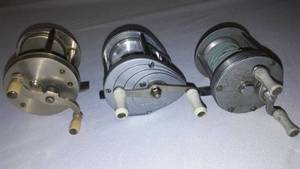lot 420 image: Fishing reels (3).