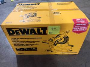 DEWALT 15 Amp Corded 12 in. Double Bevel Sliding Compound Miter Saw, Blade Wrench and Material Clamp    Customer Returns See Pictures