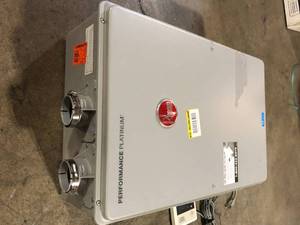 Rheem Performance Platinum 9.5 GPM Natural Gas High Efficiency Indoor Tankless Water Heater  Customer Returns See Pictures